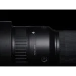Close-up of a Sigma camera lens, ideal for professional photography gear.