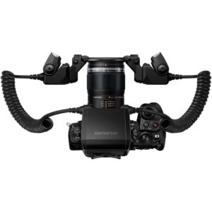 Olympus camera with macro lens and dual flash setup, ideal for professional photography.