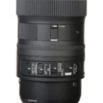 Close-up of a camera lens with focus and zoom controls, ideal for professional photography.