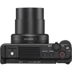 Sony ZV-1 digital camera with extended lens, ideal for vlogging and photography.
