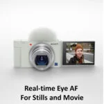 Sony digital camera with flip screen displaying a portrait, ideal for photography and video.