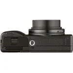 Compact digital camera body with extended lens, ideal for photography enthusiasts.