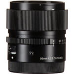 Sigma 90mm f/2.8 DG DN lens for mirrorless cameras, ideal for professional photography.