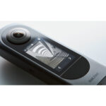 Ricoh digital camera with display showing a fisheye lens view, available at Camix UK.