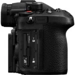 Side view of a professional camera body with dual card slots for CFexpress and SD cards.