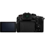 Back view of a mirrorless camera with a flip-out screen, ideal for photography enthusiasts.