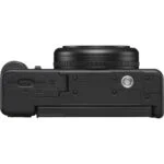Compact digital camera body with lens mount, ideal for photography enthusiasts.