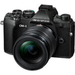 OM System OM-5 mirrorless camera with lens, available at Camix UK.