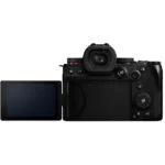 Back view of a mirrorless camera with a flip-out screen, available at a UK camera shop.