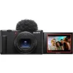 Sony digital camera with flip screen displaying a group photo, ideal for vlogging and photography.