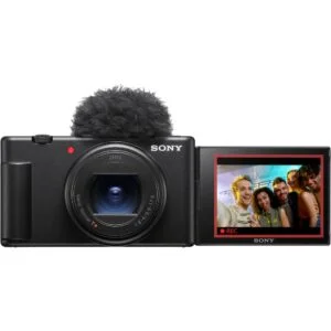 Sony digital camera with flip screen displaying a group photo, ideal for vlogging and photography.