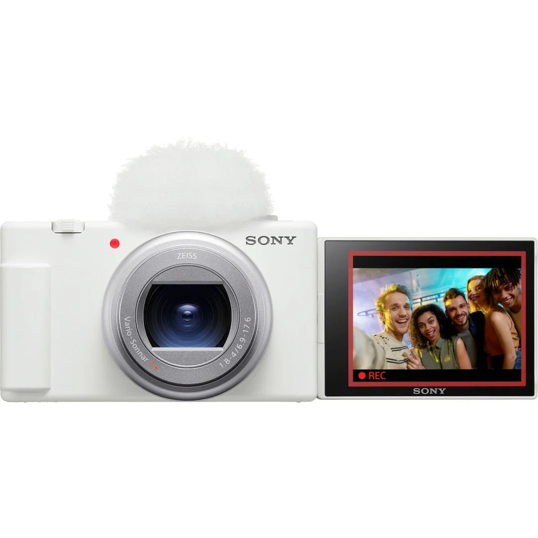 1684837829_1767284 Sony digital camera with flip screen displaying a group photo, available at Camix UK.