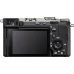 Back view of a mirrorless camera with LCD screen and control buttons.