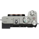 Top view of a mirrorless camera body with control dials and buttons.