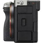 Side view of a mirrorless camera body with textured grip, available at Camix UK.