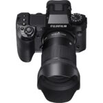 Fujifilm mirrorless camera with lens, available at Camix camera shop UK.