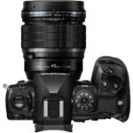 Top view of Olympus mirrorless camera with M.Zuiko Digital 45mm lens.