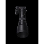 Professional camera with large telephoto lens on black background, available at Camix UK.
