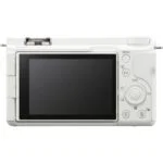 Back view of a white mirrorless camera with LCD screen and control buttons.