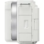 Side view of a white mirrorless camera body with lens mount, available at Camix UK.