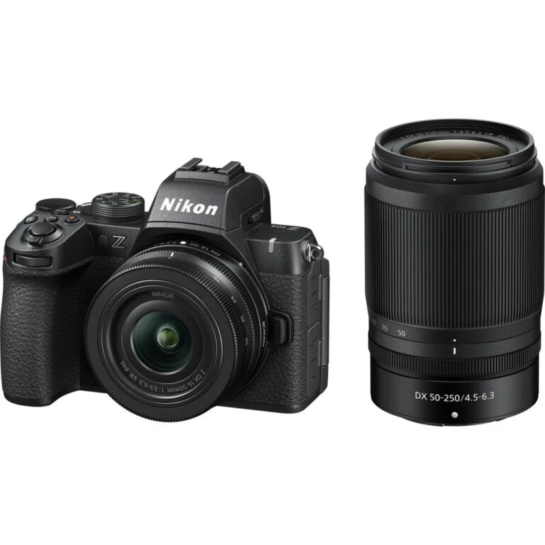 Nikon mirrorless camera with lens, available at Camix UK.
