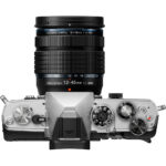 Top view of a mirrorless camera with a 12-45mm lens, ideal for photography enthusiasts.