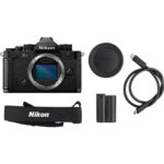 Nikon Z camera kit with body, lens cap, battery, strap, and USB cable.