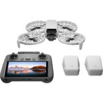 DJI drone with controller and batteries, ideal for aerial photography and videography.
