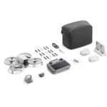 DJI drone with accessories including controller, batteries, and carrying case.