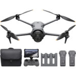 DJI drone with controller, batteries, and accessories from Camix camera shop UK.