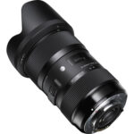 Sigma zoom lens for DSLR cameras with lens hood, available at Camix camera shop UK.