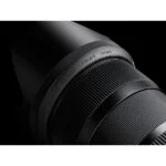 Close-up of a Sigma 18-35mm f/1.8 DC lens, ideal for DSLR and mirrorless cameras.