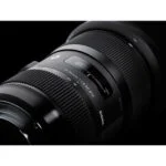 Close-up of a Sigma 18-35mm f/1.8 DC HSM Art lens for digital cameras.