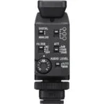 Close-up of a professional camera audio interface with controls for digital and analog settings.