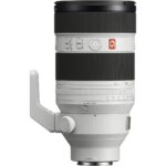 Sony telephoto lens with tripod mount, ideal for professional photography.