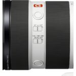 Sony G Master lens with focus and DMF switches, ideal for professional photography.
