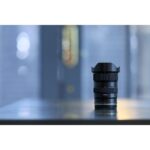 Tamron camera lens on display in a camera shop in the UK.