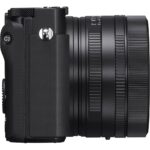 Side view of a mirrorless camera with attached lens, available at Camix UK.