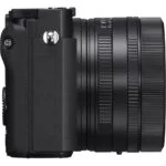 Side view of a mirrorless camera with attached lens, available at Camix UK.