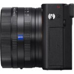 Side view of a compact digital camera with Zeiss lens, ideal for photography enthusiasts.