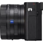 Side view of a compact digital camera with Zeiss lens, ideal for photography enthusiasts.