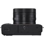Compact digital camera body with lens, ideal for photography enthusiasts.