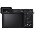 Rear view of a digital camera with a tilting screen and electronic viewfinder.