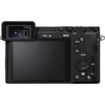 Back view of a digital camera with a screen and controls, ideal for photography enthusiasts.