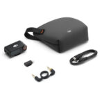 DJI camera accessory kit with case, cables, and adapter.