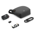 DJI camera accessory kit with case, cables, and adapter.