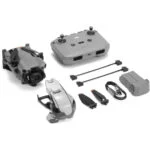 DJI drone with controller, battery, propellers, and accessories from Camix camera shop UK.