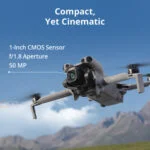 Compact drone with 1-inch CMOS sensor and 50 MP camera flying over mountains.