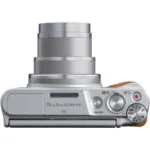 Canon PowerShot SX740 HS digital camera with extended lens, top view.