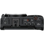 Top view of a professional camera body with control dials and buttons, ideal for photography enthusiasts.
